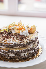 Image showing cake with walnuts and physalis