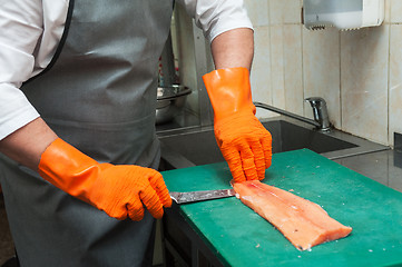 Image showing cutting salmon fish