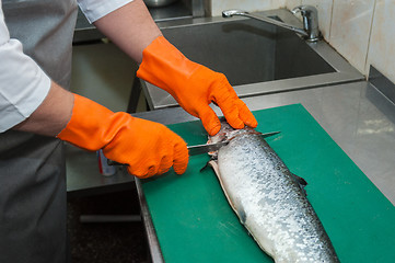 Image showing cutting salmon fish