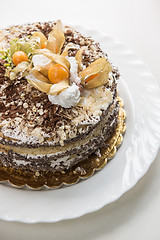 Image showing cake with walnuts and physalis
