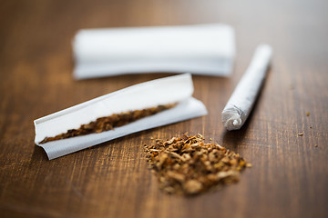 Image showing close up of marijuana joint and tobacco