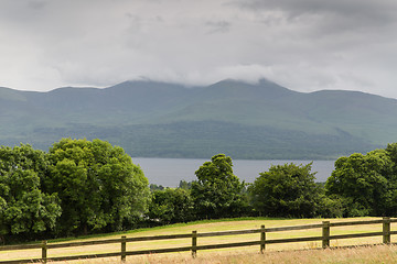 Image showing view to lake and farmland at connemara in ireland