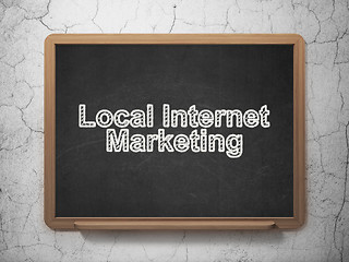 Image showing Advertising concept: Local Internet Marketing on chalkboard background