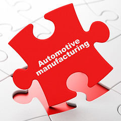 Image showing Industry concept: Automotive Manufacturing on puzzle background