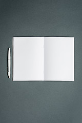 Image showing Mock-up business notebook. Gray background.