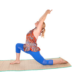 Image showing Yoga stretching from trainer.