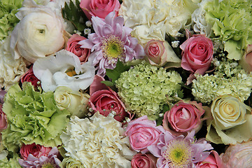 Image showing Pink, green and white bridal arrangement