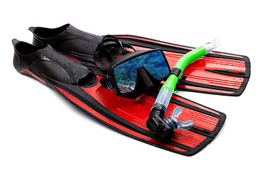 Image showing Snorkel, flippers and mask with reflection of blue sea