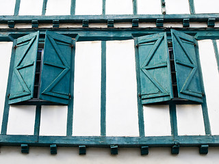 Image showing Green wooden wall windows