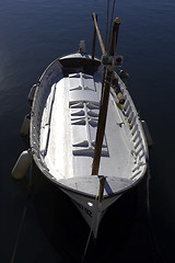 Image showing Single wooden white fishing boat