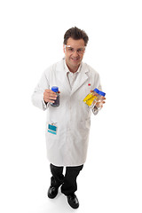 Image showing Scientist carrying lab bottles