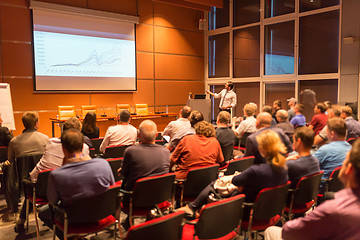 Image showing Business speaker giving a talk in conference hall.