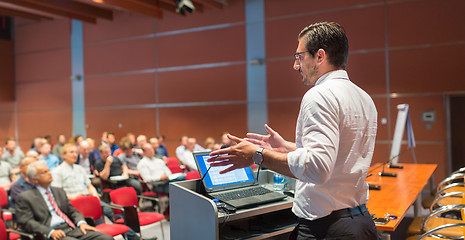 Image showing Public speaker giving talk at Business Event.