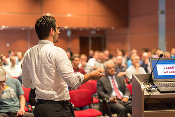 Image showing Public speaker giving talk at Business Event.