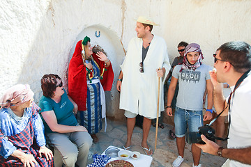 Image showing Tourists at troglodyte home