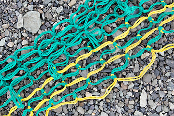 Image showing Fishing nets on a beach