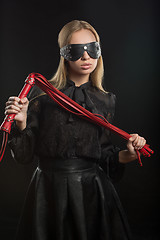 Image showing Portrait of young beautiful woman in blindfold