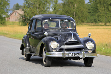 Image showing Black BMW 340 Classic Car Cruising along Country Road