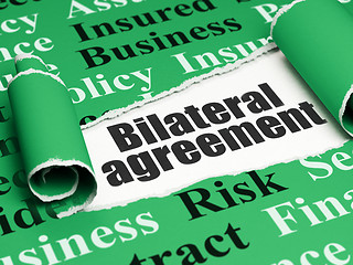 Image showing Insurance concept: black text Bilateral Agreement under the piece of  torn paper