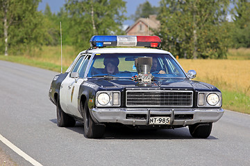 Image showing Customized Plymouth Police Car on the Road