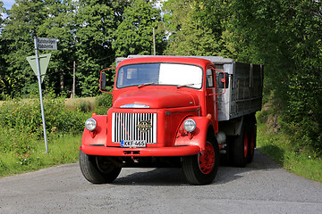 Image showing Classic Red Volvo N86 Truck Enters Highway