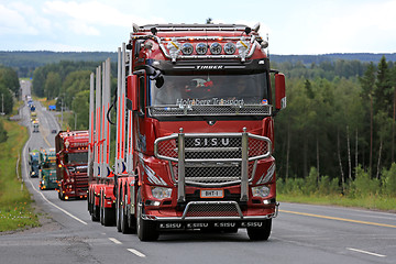 Image showing Red Sisu Polar Logging Truck in Convoy