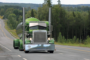 Image showing Green Peterbilt 359 Tank Truck on Scenic Highway