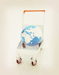 Image showing Trolley for luggage at the airport and earth. International tour