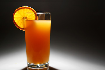 Image showing backlit orange Juice