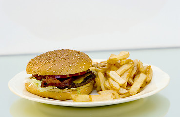 Image showing cheeseburger and fries