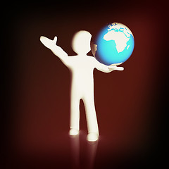 Image showing 3d man holding a glowing earth on a mysterious black background 