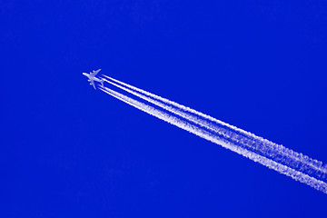Image showing Plane in blue sky - Bright blue sky