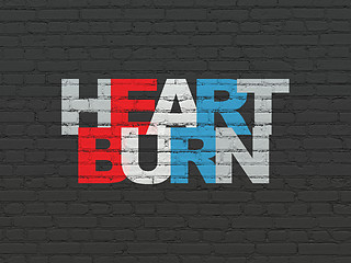 Image showing Health concept: Heartburn on wall background