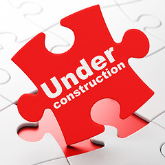 Image showing Web design concept: Under Construction on puzzle background