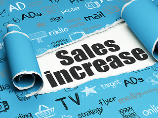 Image showing Marketing concept: black text Sales Increase under the piece of  torn paper