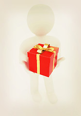 Image showing ?? ????? ???? 3d man and red gifts with gold ribbon. 