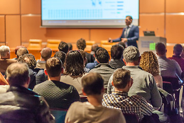 Image showing Business speaker giving a talk in conference hall.