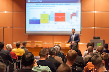 Image showing Business speaker giving a talk in conference hall.