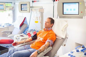 Image showing Blood donor at donation.