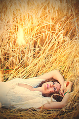 Image showing woman lying in the grass