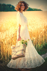 Image showing beautiful smiling woman in white syled dress outdoors