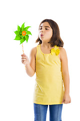 Image showing Girl blowing a windmill
