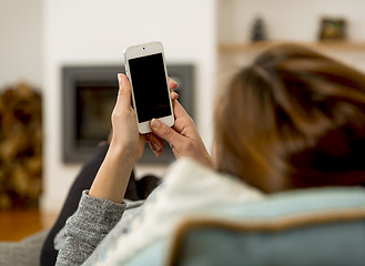 Image showing Woman texting