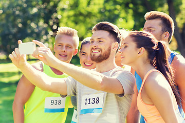 Image showing teenage sportsmen taking selfie with smartphone