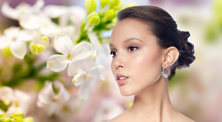 Image showing close up of beautiful woman face with earring