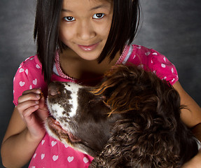 Image showing Child and dog