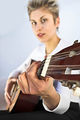 Image showing woman and guitar