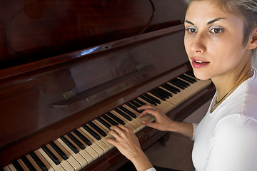 Image showing woman and piano