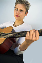 Image showing woman and guitar