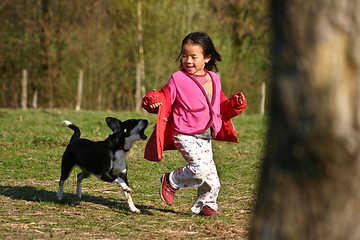 Image showing Child and dog